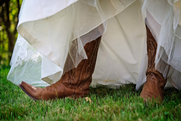 bride cowboy boots rustic fall wedding on a farm