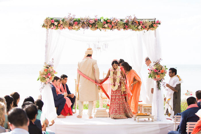 indian-cultural-pink-red-vibrant-wedding-florida-beach-ceremony-inspiration32